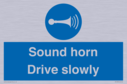 sound-horn-drive-slowly-warehousing-and-delivery-sign~